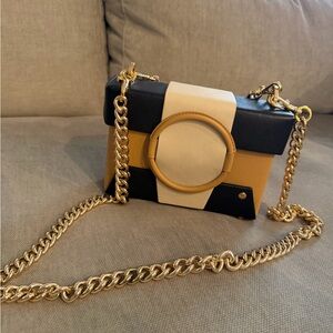 Yuzefi Black, Cream, and Tan Crossbody Bag